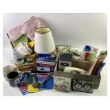Household Items Including Books, Linens, and Elect