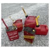 Five gas cans : 3 plastic and 2 metal : some are