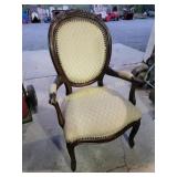 Ornately Carved Wood Armchair With Upholstered Bac