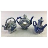 Blue and White Teapots with Floral and Geometric M