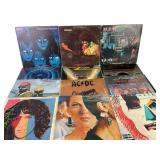 Vinyl Records: Kiss, AC/DC, and REO Speedwagon