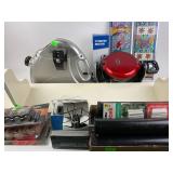 Table legs, D batteries, oster waffle maker,
