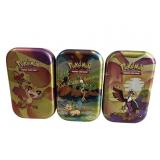 Collector Pokemon Tins with dice, cards, stickers