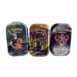 Collector Pokemon Tins with dice, cards, stickers