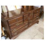 Wooden Dresser With Brass Hardware and Nine Drawer