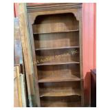 Tall Wooden Bookcase With Carved Details and Adjus