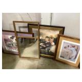 Framed Decorative Artwork and Empty Mirror Frame