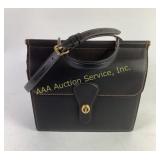 Black Leather Coach Satchel with Adjustable Strap