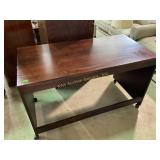 Wood Desk with Dark Finish and Rolling Casters