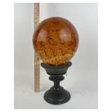 Controlled bubbles amber glass sphere, wooden
