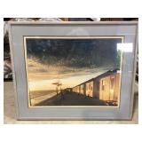 Framed Coastal Sunset Photograph with Wooden Cabin