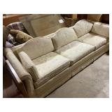 Floral Upholstered Sofa with Scalloped Backrest