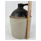 One gallon stoneware jug. Two tone: brown top,