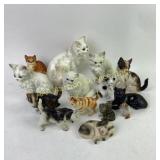 Ceramic Figurines of Cats in Various Poses and Sty
