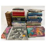 Various books on biology, astronomy, black holes,