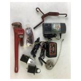 Tools and Devices Including Pipe Wrench, Battery C