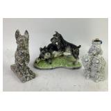 Dog Figurines Including Stone and Porcelain Pieces