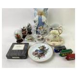 Porcelain Figurines, Decorative Plates, Teacups, a