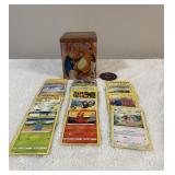 Stacking Charizard Tin with cards