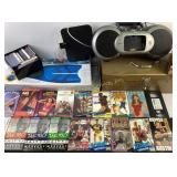 Metal toolbox, s/m blue flippers, VHS workout