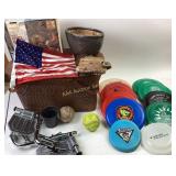 Sporting Equipment, Frisbees, Picnic Basket, Plant