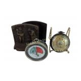 Barometers and Cast Iron Bookends with Fisherman D