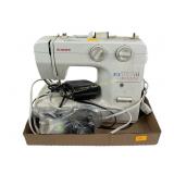 Singer Sewing Machine with Accessories and Foot Pe