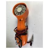 Wire Baskets, Orange Rotary Phone, and Spray Paint