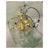 Hanging chandelier light with floral etched panels