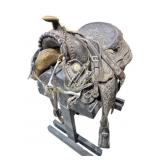 Western Saddle on Wooden Saddle Stand