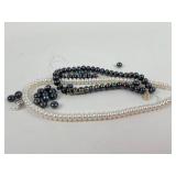 (2) broken strands of cultured pearls, one with