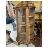 Wood Curio Cabinet with Curved Glass Front.