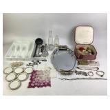 Silver-tone platter, keys, Glass bottles, and Jewe