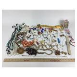 Costume Jewelry: pearl like necklaces, flower pin