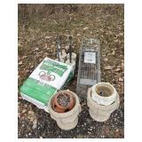 Concrete planters, peat moss, animal trap