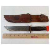 Fixed blade knife in leather sheath, 11 inches.