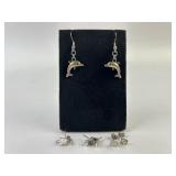 .925 Sterling Silver marked earrings: Dolphins