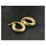 Pair 14k gold earrings. 1.22 grams