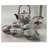 Porcelain Teapots With Floral Design