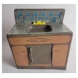 Metal Childs Toy Sink With Blue Tile Backsplash