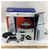 Sony PS5 with remote in box, lights up and makes