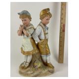 Porcelain Bisque Figurine of Boy and Girl in Gold