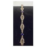 Sterling bracelet with blue stones. Total weight