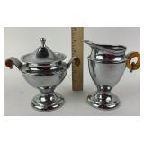 Chrome plated sugar and creamer set with bakelite