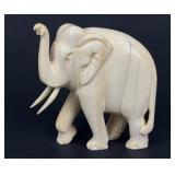 Antique carved elephant figurine, natural