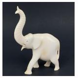 Antique carved elephant figurine, natural