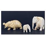 (3) antique elephant figurines, natural material.