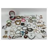 Costume Jewelry: feather earrings, beaded necklace