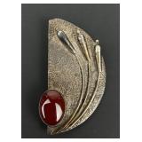 Silver Brooch with a Carnelian Cabochon Stone