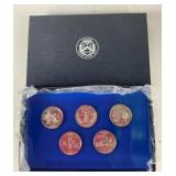 United States Mint Treasury quarters set in lucite